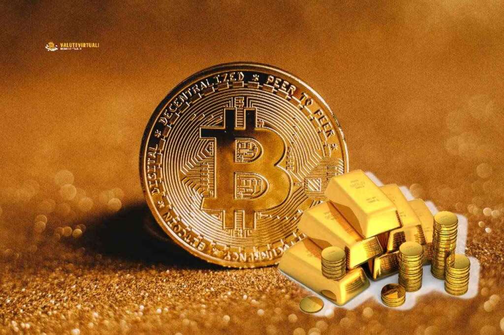 Una moneta di Bitcoin posata su una superficie dorata con alcuni lingotti in sovrimpressione in basso a destra