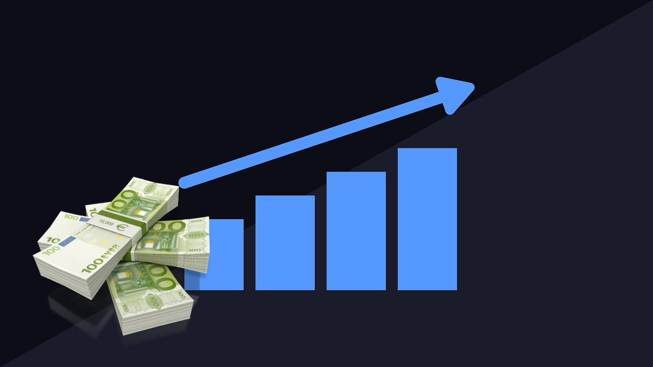 grafico al rialzo con mazzo di soldi