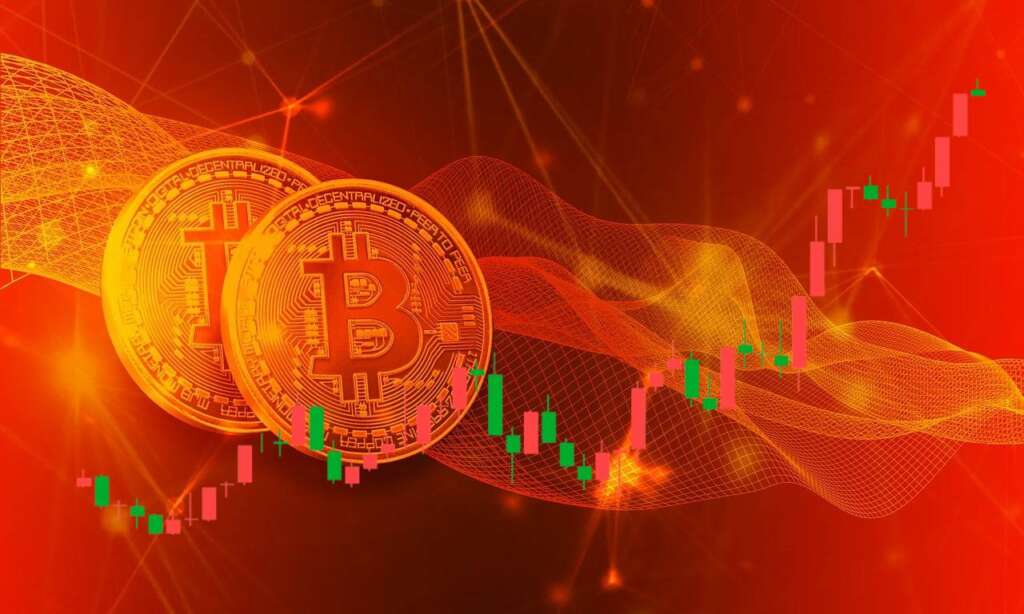 monete Bitcoin e grafico a candela