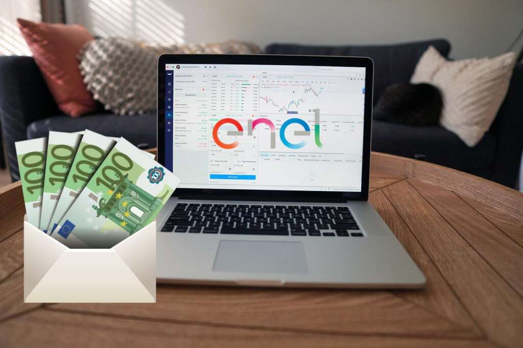 laptop con logo di Enel e busta di soldi
