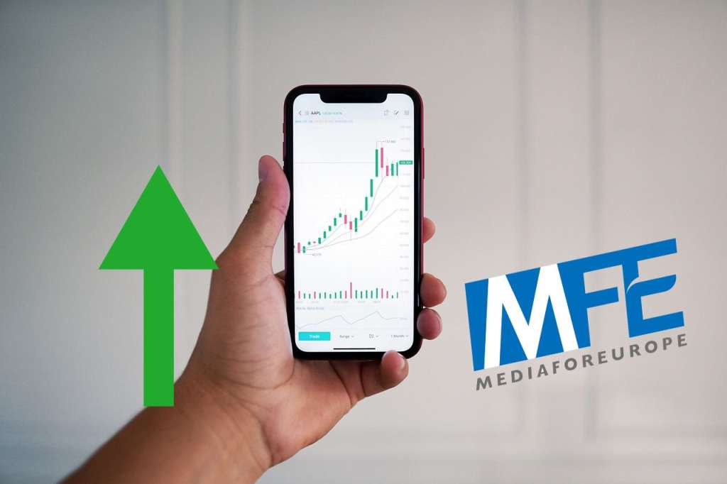 mobile trading con logo di MEF e freccia verde